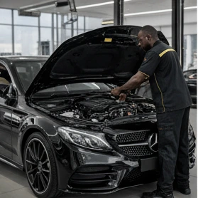 Techinician inspecting a vehicle
